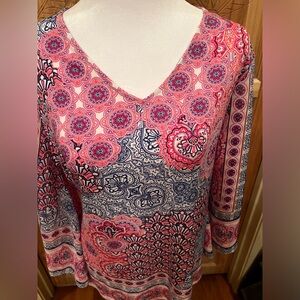 Ladies pink pull over top with a flare sleeve size 16